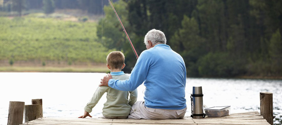bigstock-Senior-man-fishing-with-grands-33112739